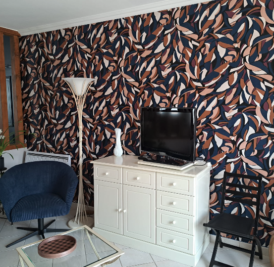 Réalisation de décoration intérieure avec aménagement, couleurs et matériaux sélectionnés par Marchand Décoration.